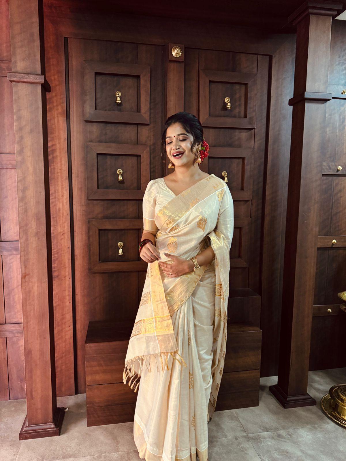 Thamburatti Golden Tissue Saree – Regal Elegance in Every Drape