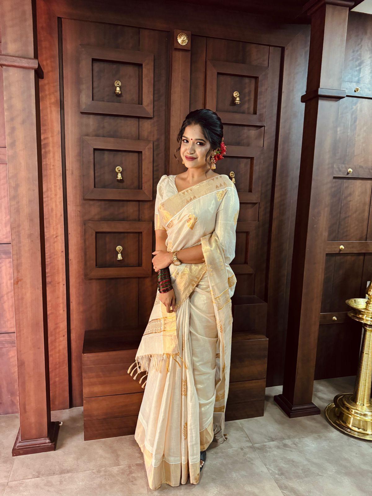 Thamburatti Golden Tissue Saree – Regal Elegance in Every Drape